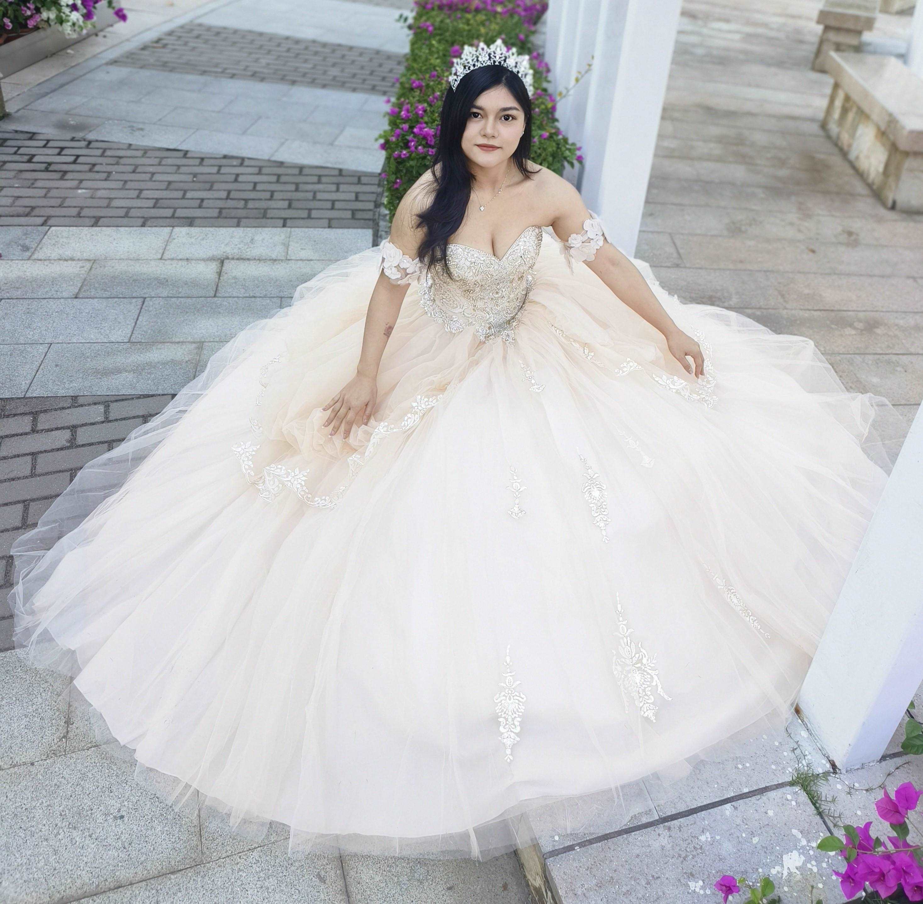 Adults in gowns, flowing skirts, confident display.