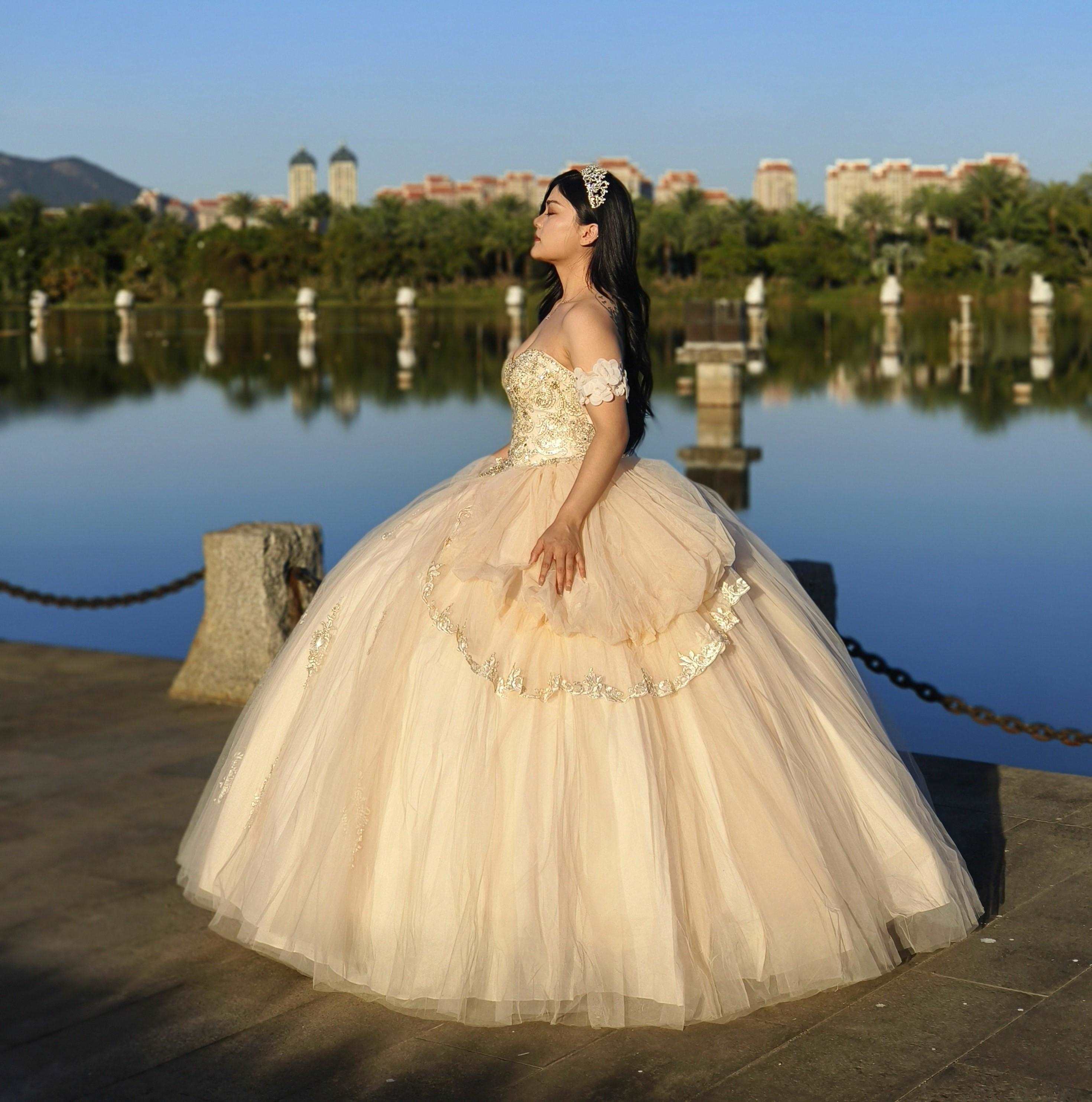 Adults in gowns, flowing skirts, confident display.