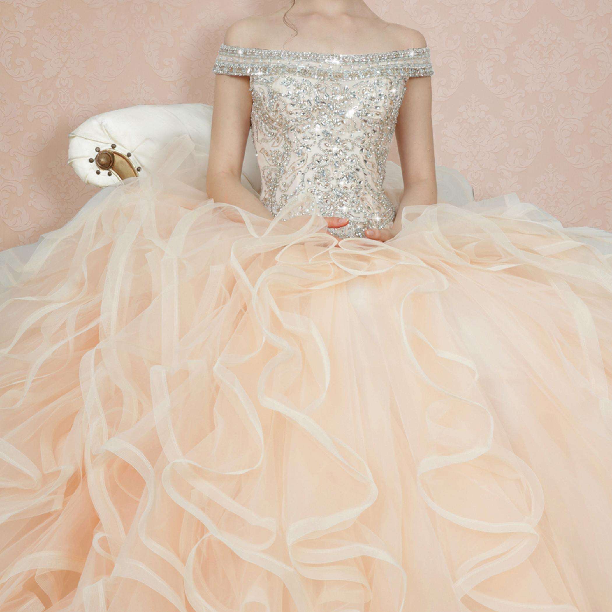Gowns' elegance, simple hues, enhance life's charm.