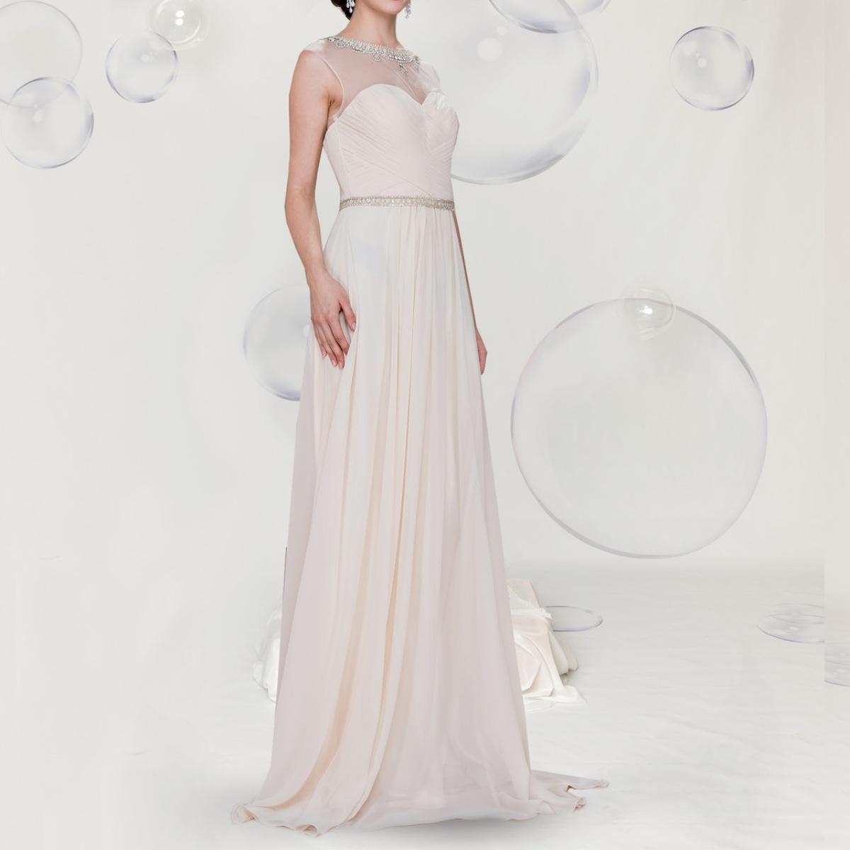 A beautiful gown, off-shoulder, reveals noble air.