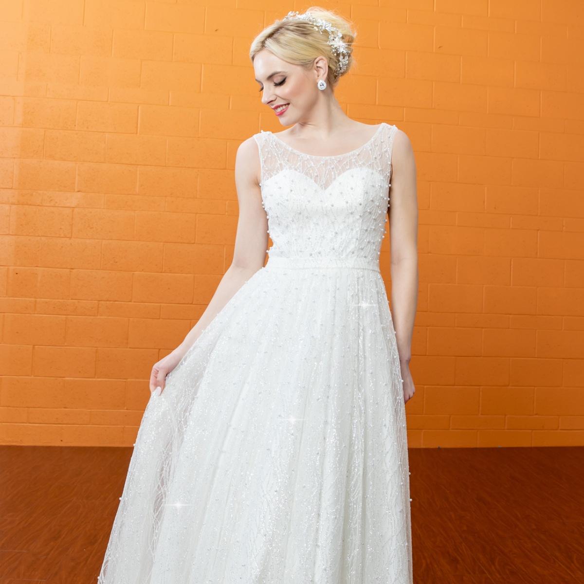 Gowns shine, lace details, light up occasions.