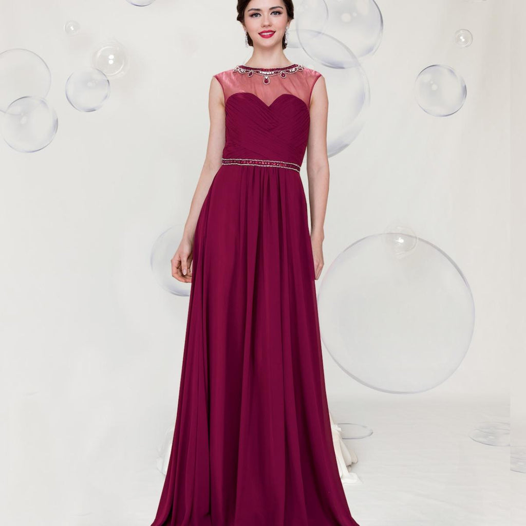 A beautiful gown, off-shoulder, reveals noble air.