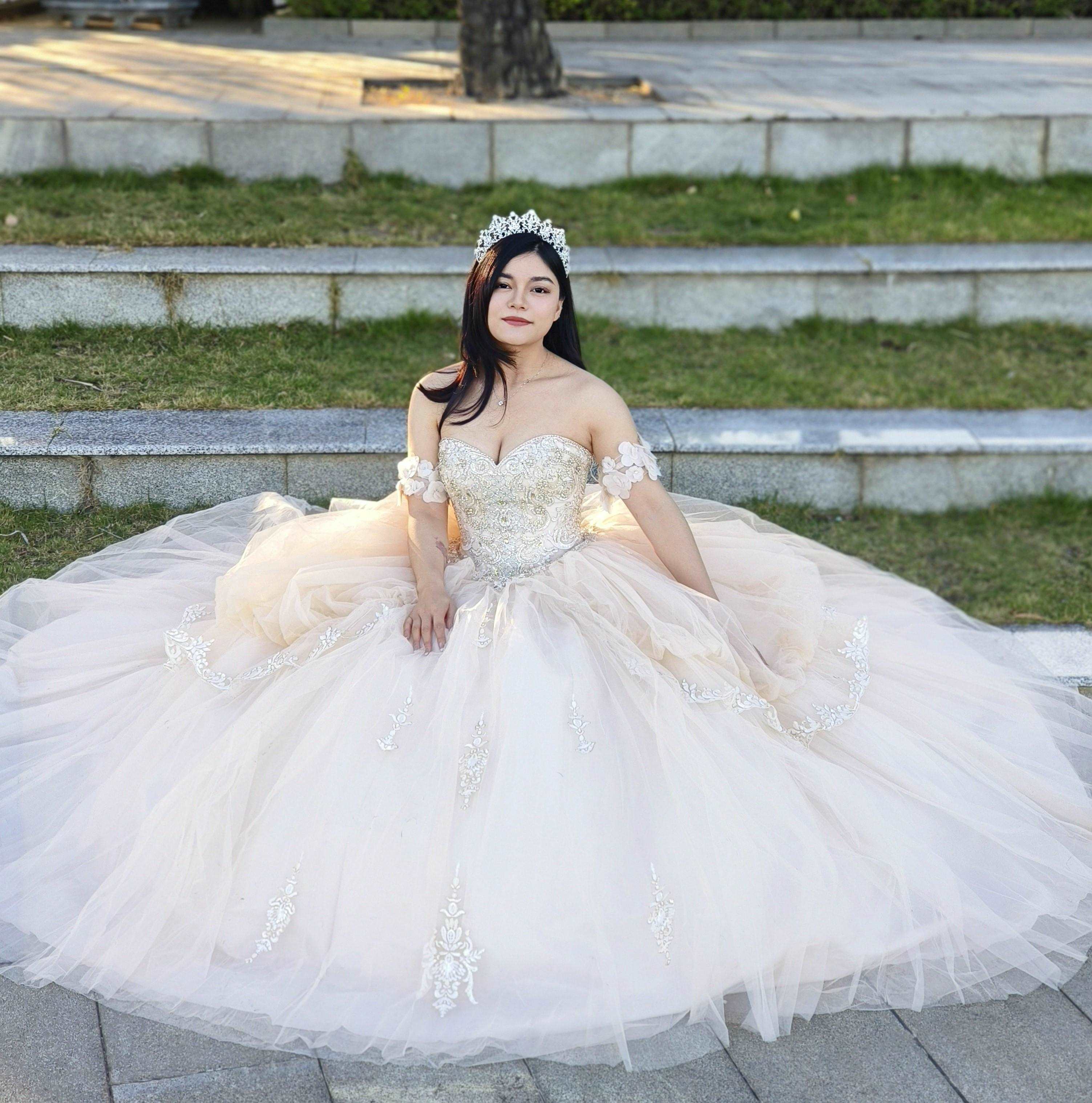 Adults in gowns, flowing skirts, confident display.