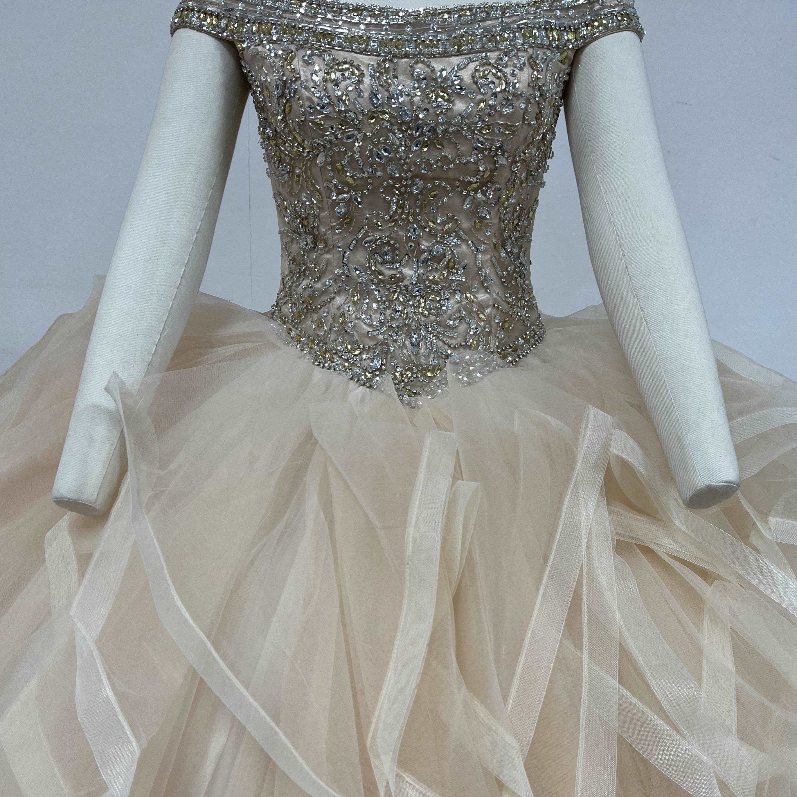 Gowns' elegance, simple hues, enhance life's charm.