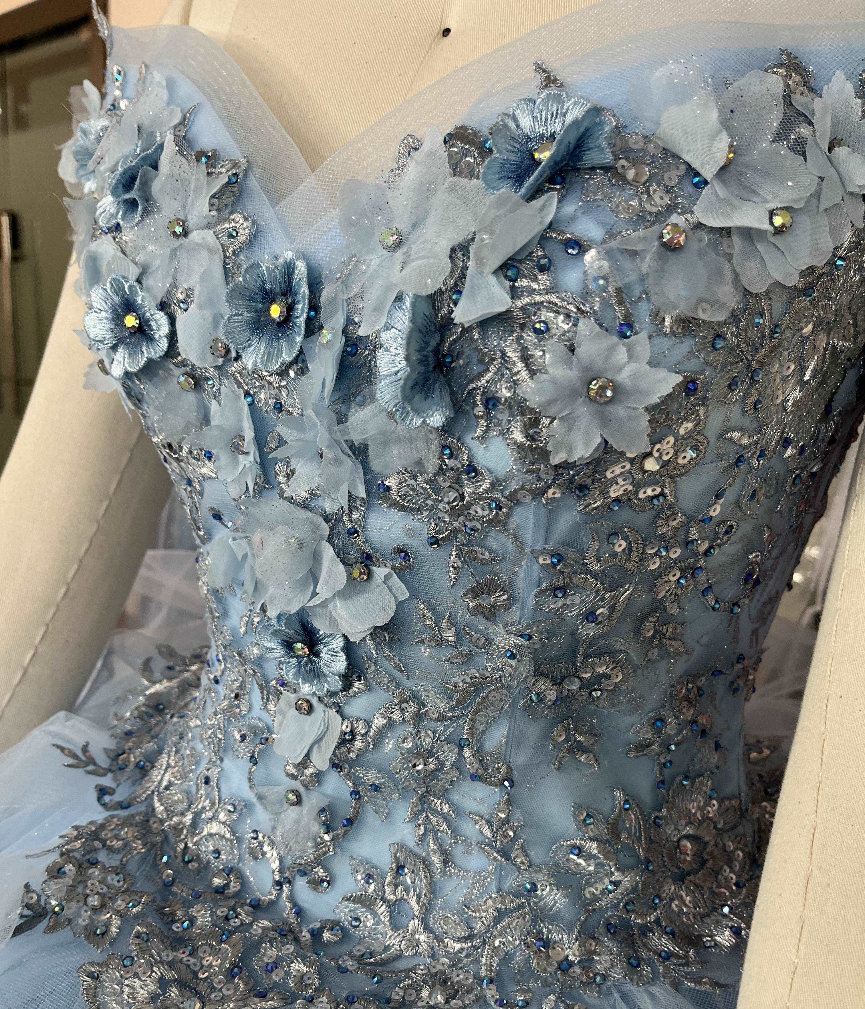 Gowns' elegance, simple hues, enhance life's charm.