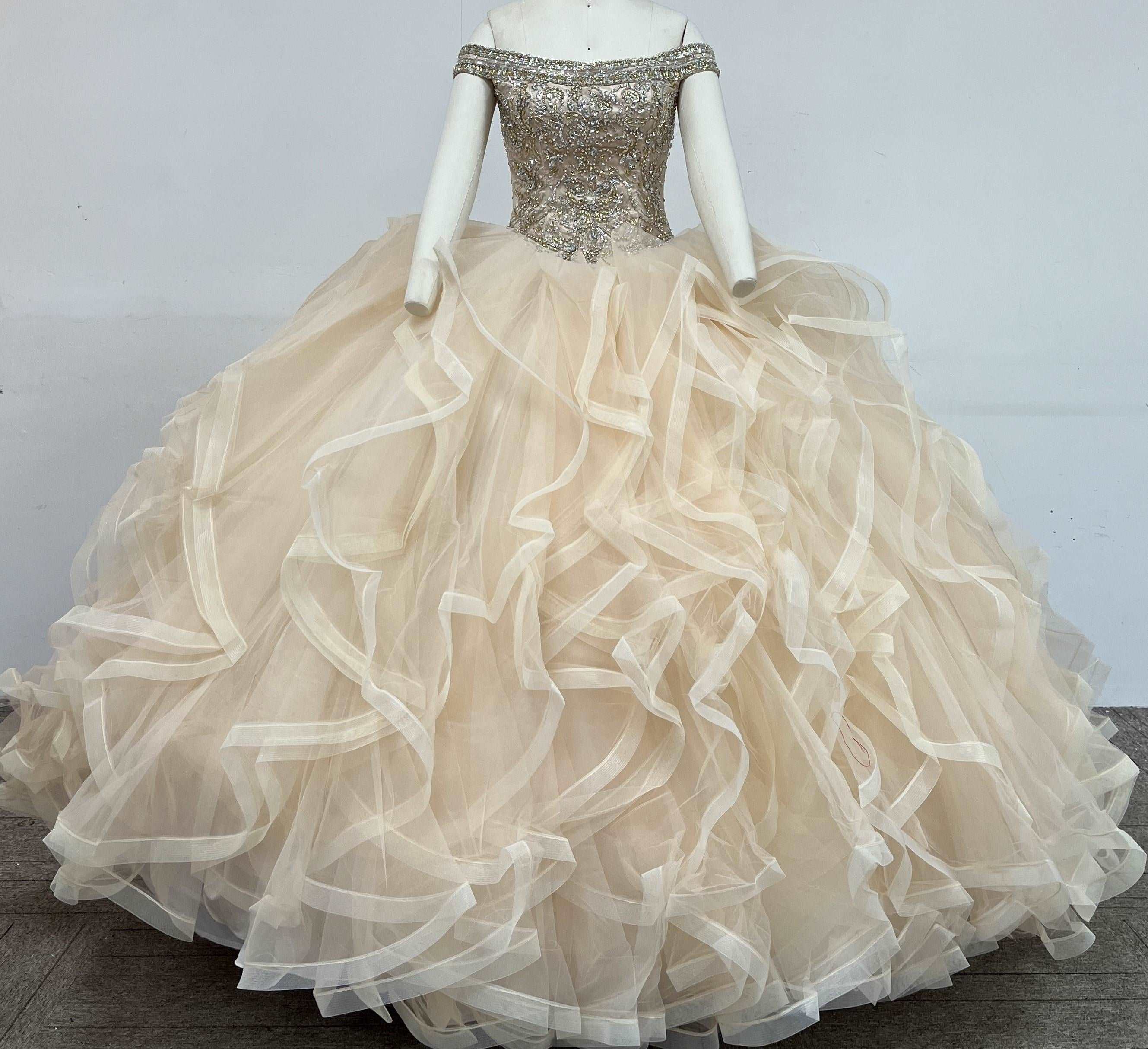 Gowns' elegance, simple hues, enhance life's charm.