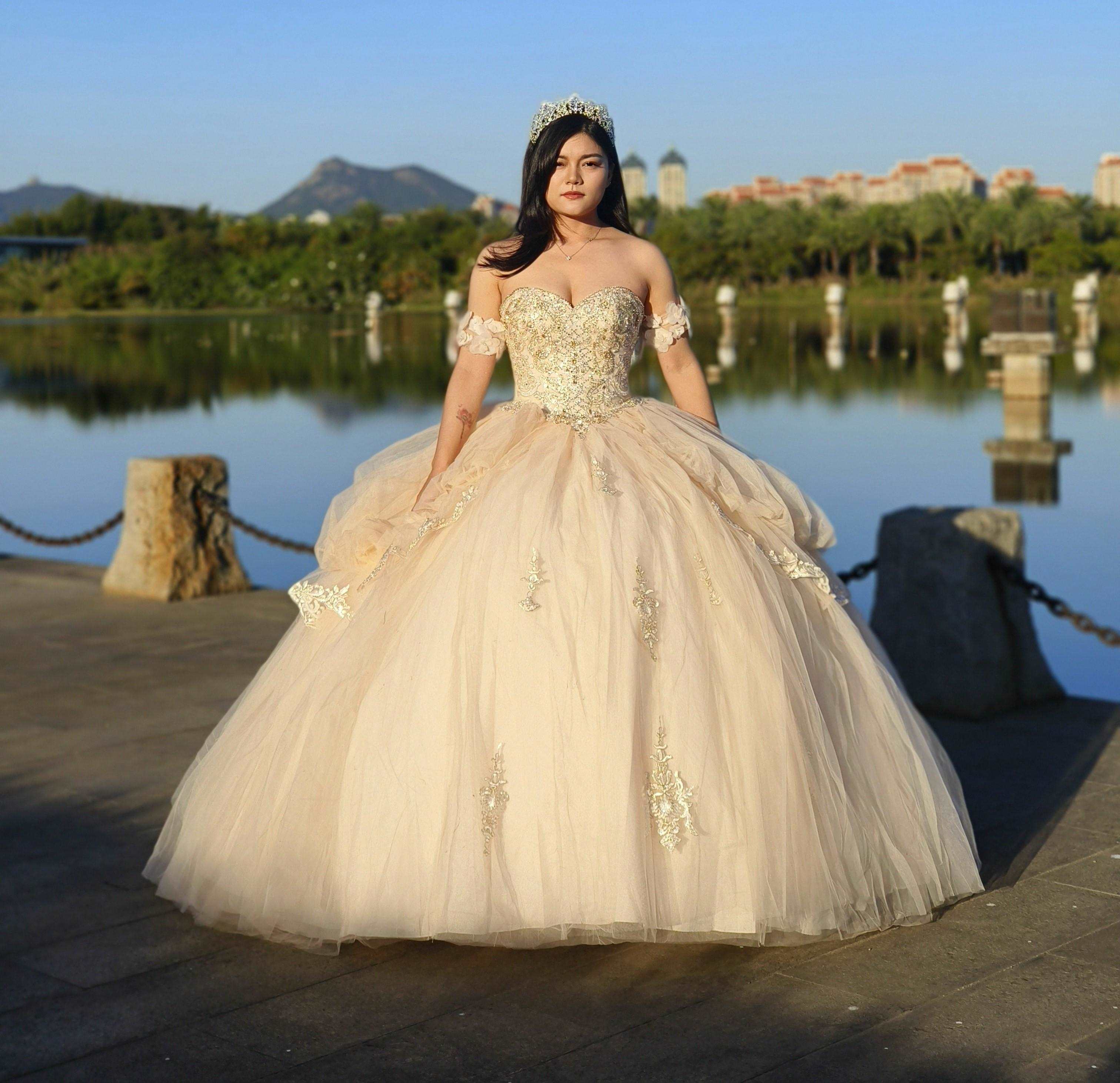 Adults in gowns, flowing skirts, confident display.