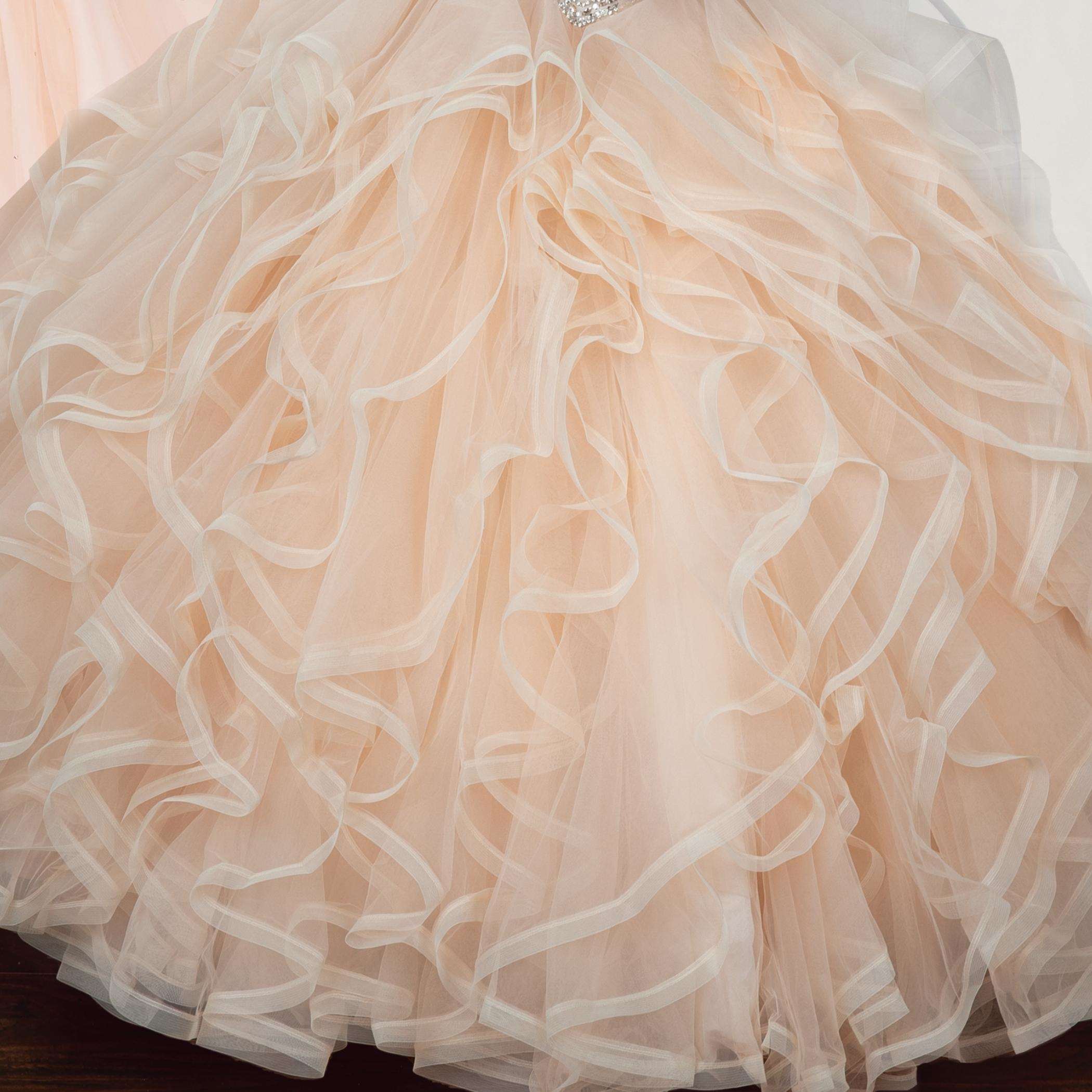 Gowns' elegance, simple hues, enhance life's charm.