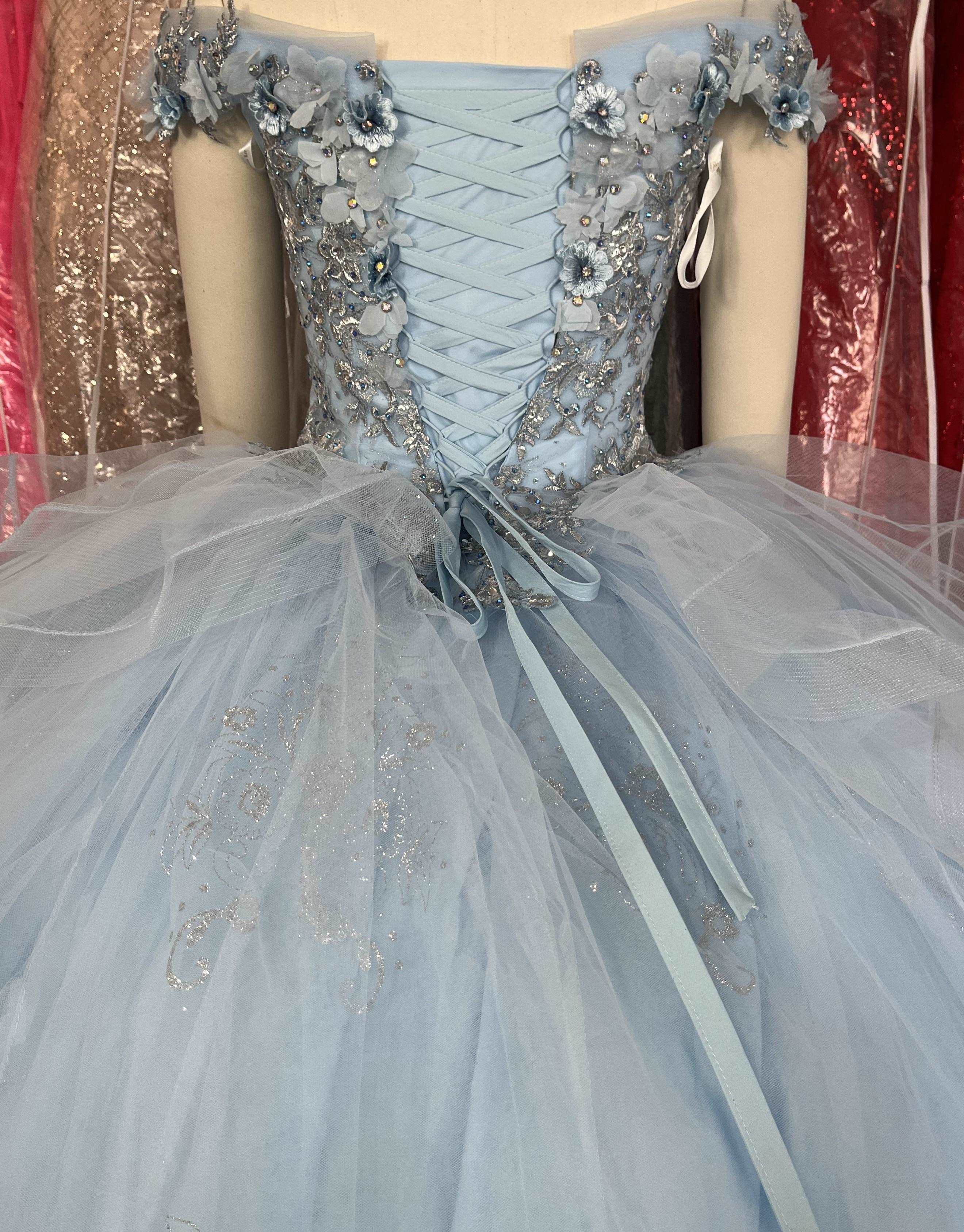Gowns' elegance, simple hues, enhance life's charm.