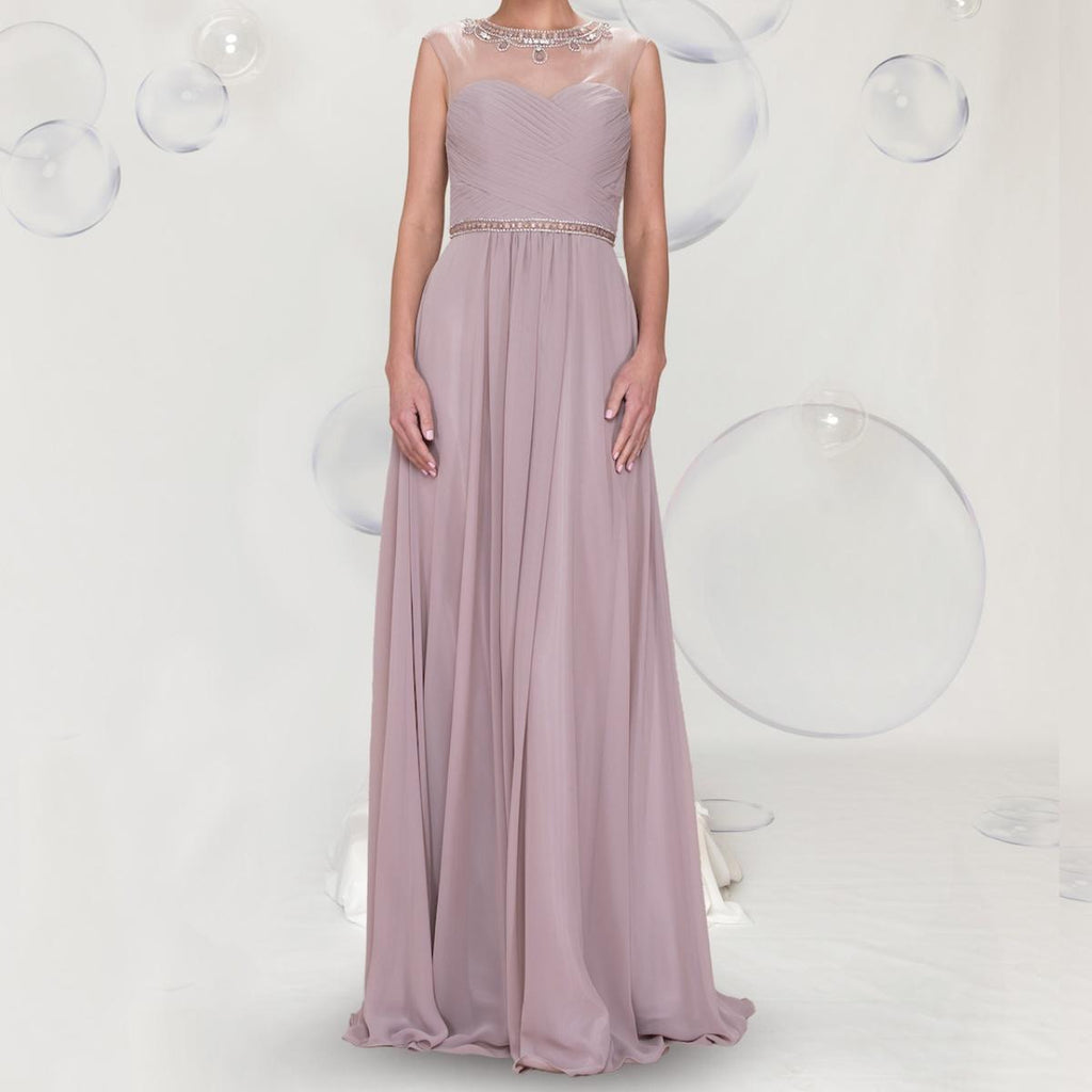 A beautiful gown, off-shoulder, reveals noble air.
