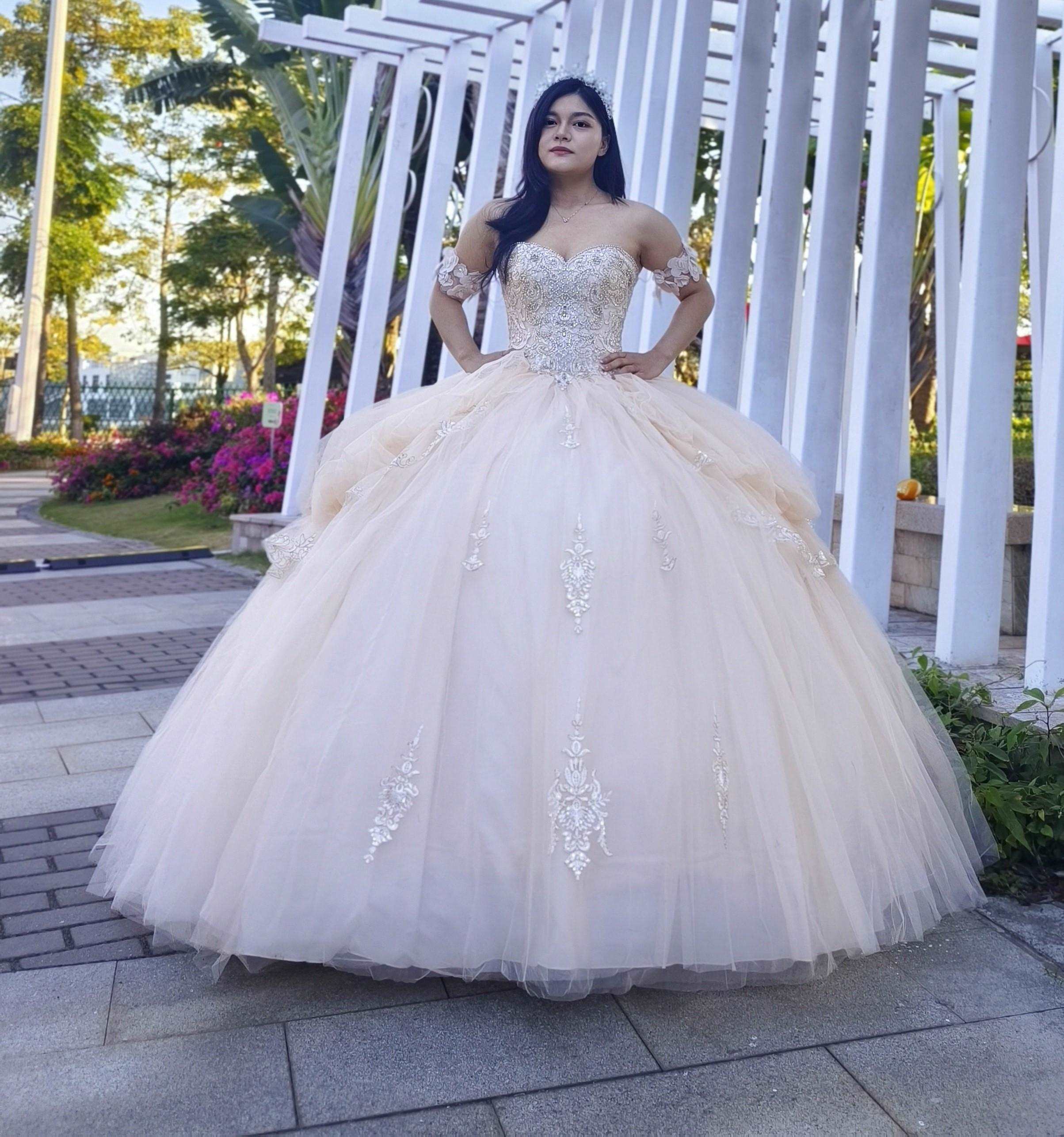 Adults in gowns, flowing skirts, confident display.