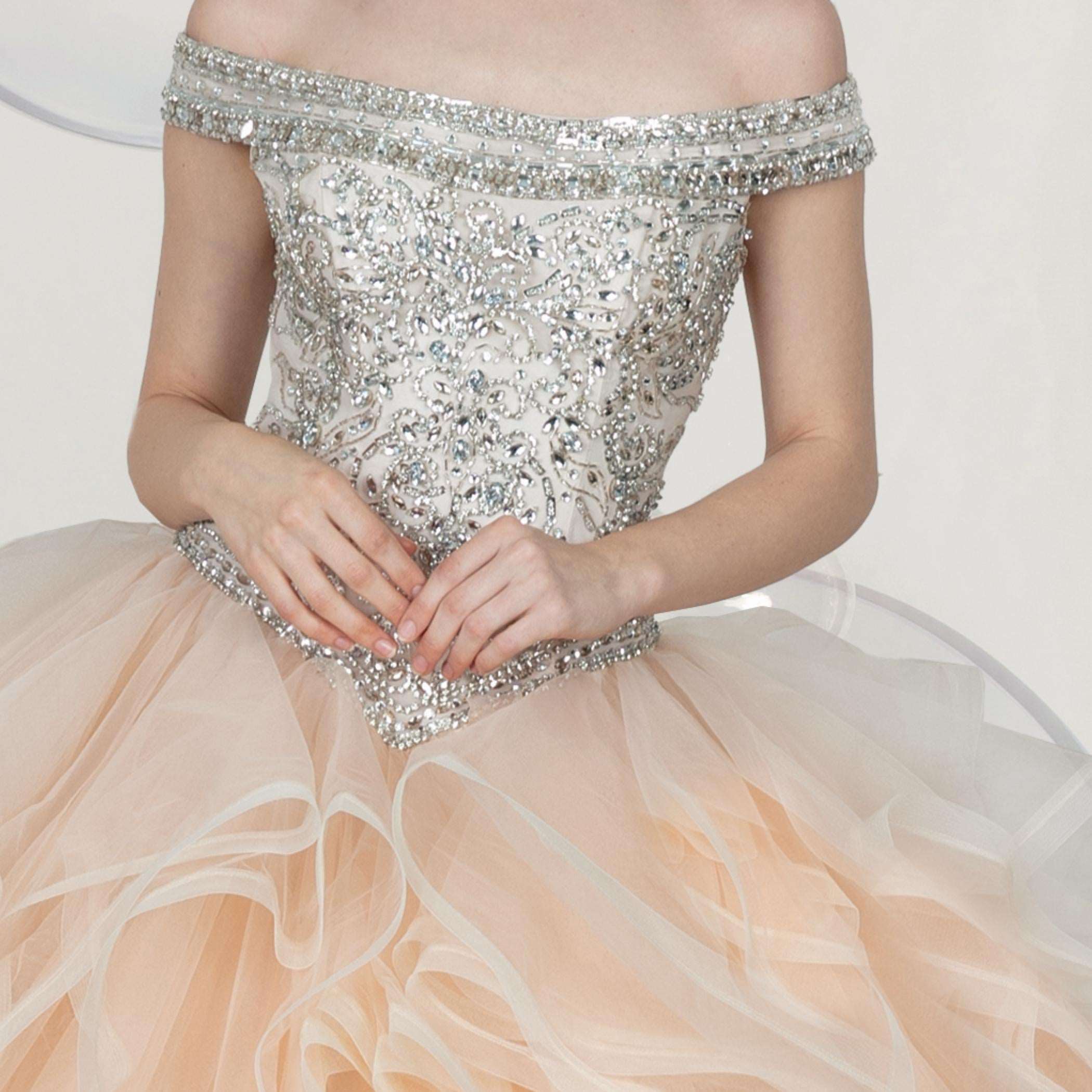 Gowns' elegance, simple hues, enhance life's charm.
