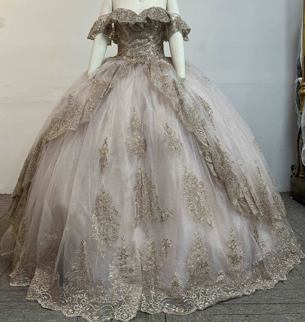 Gowns' elegance, simple hues, enhance life's charm.