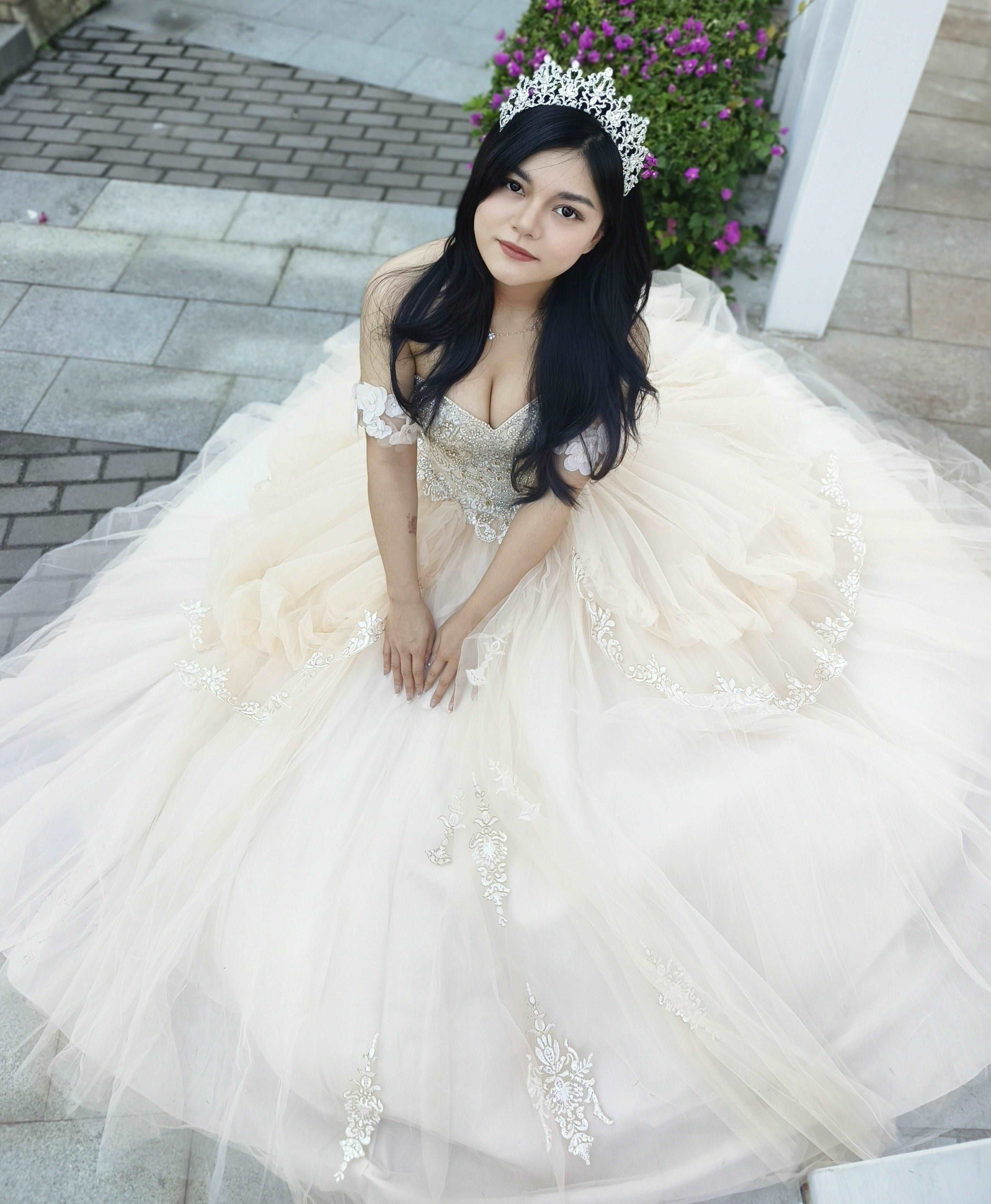 Adults in gowns, flowing skirts, confident display.